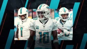 Directivos y aficionados observan un campo de fútbol americano en Miami y Madrid, símbolo de la estrategia NFL en español de Dolphins global hacia América Latina