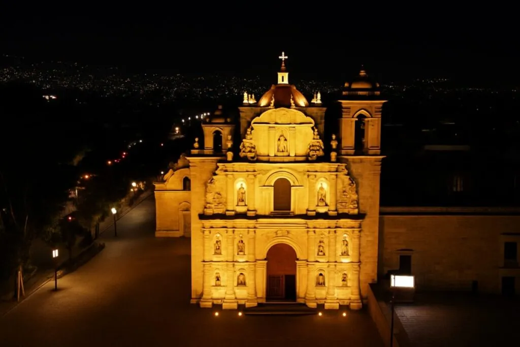 Fachada nocturna de la Basílica de la Soledad en Oaxaca iluminada con luz LED escénica y moderna
